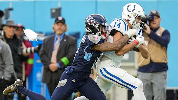 Indianapolis Colts wide receiver Alec Pierce (14) receives a long pass to put the Colts at first and goal in overtime Sunday, Dec. 3, 2023, at Nissan Stadium in Nashville, Tenn. The Colts went on to score to win in overtime, 31-28.
